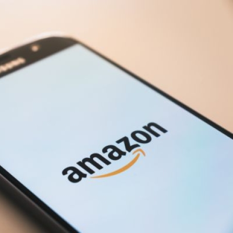 A phone with the Amazon logo on