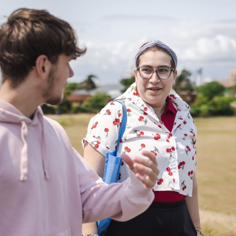 Two people talking