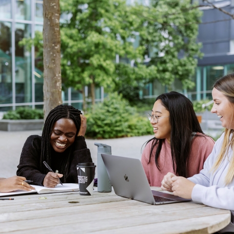 Four University of Portsmouth students talking
