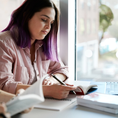 Two women studying