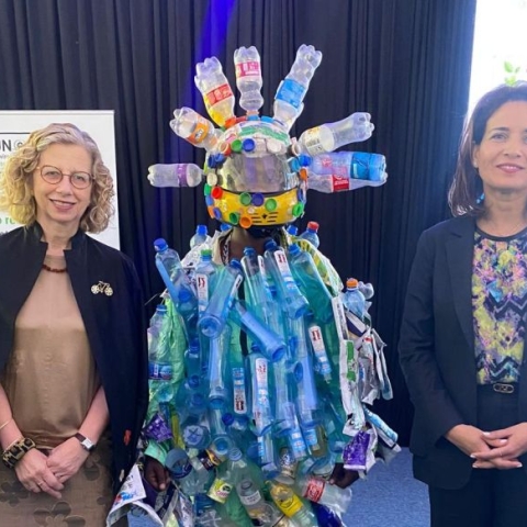 Inger Andersen, Director of the United Nations Environment Programme, meets a plastic monster at UNEA-6