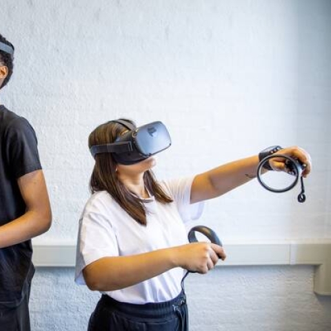 Two people using VR