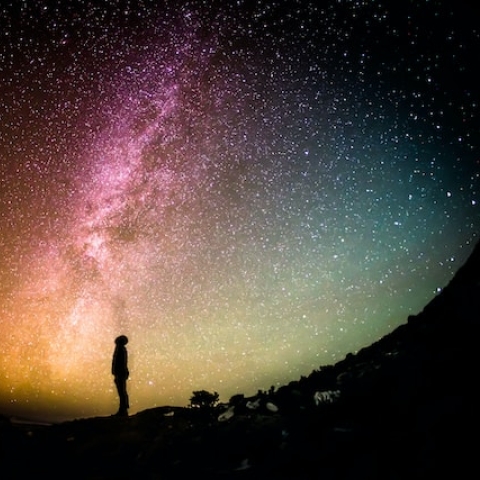 Man looking at the night sky