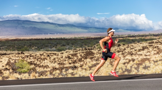 Triathlete running uphill