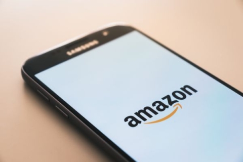A phone with the Amazon logo on