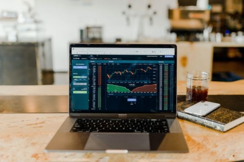 financial markets on a laptop