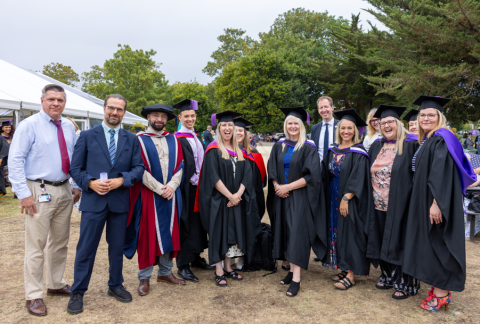 Probation Officer graduates stood outside smiling