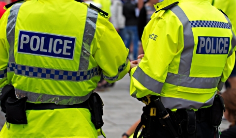Two police officers in high visibility uniform