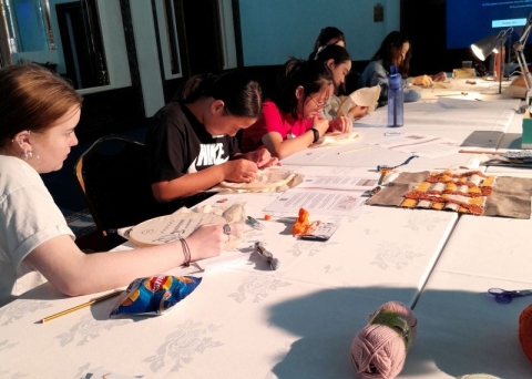 Students making cushions at a workshop