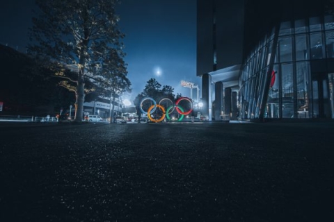 The Olympic rings glowing at night