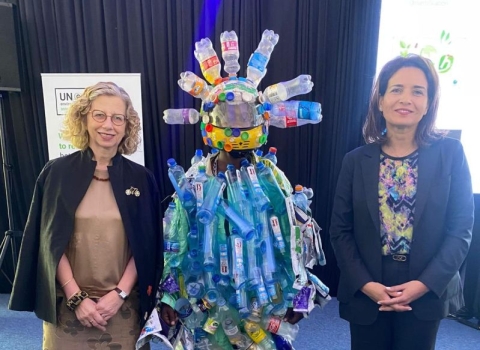 Inger Andersen, Director of the United Nations Environment Programme, meets a plastic monster at UNEA-6