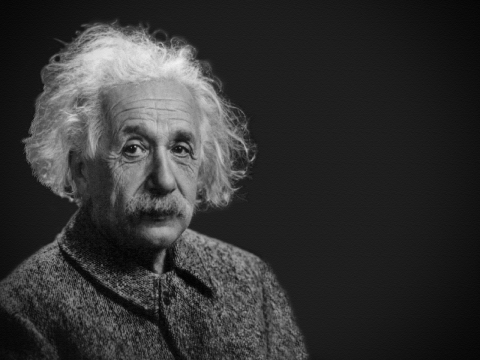 A black and white photo of Albert Einstein