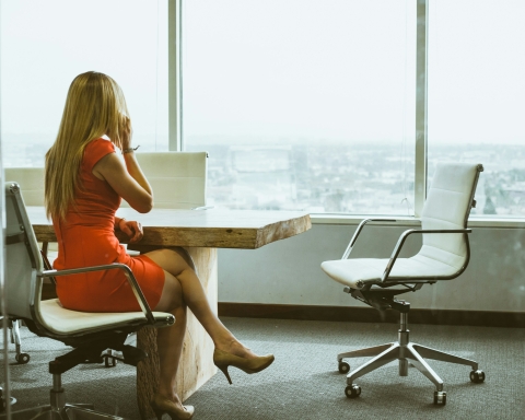 woman sitting in office