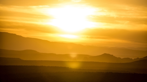 photo of the sun as it sits low in the sky