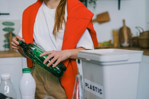 Person holding a plastic bottle