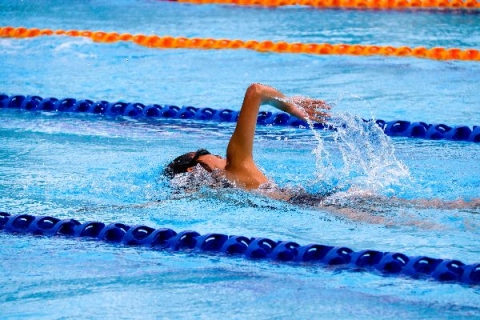 Swimming - Photo by Marcus Ng on Unsplash