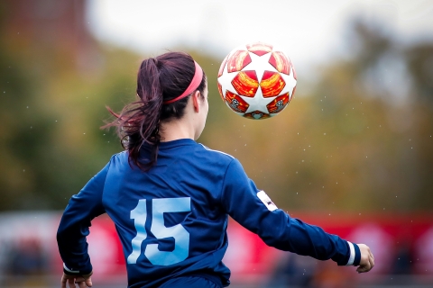 unsplash image of woman football player