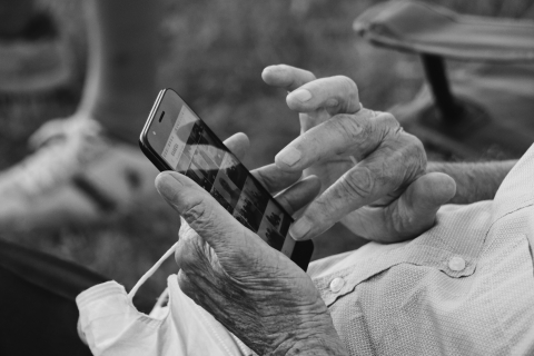 elderly person on phone