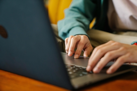 hands on laptop pexels image