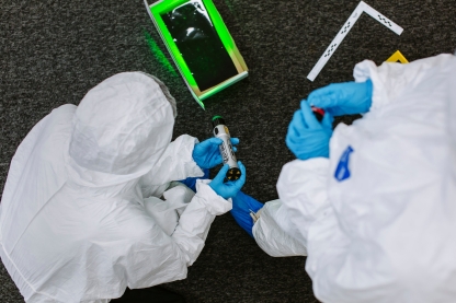 forensic investigators investigating a scene