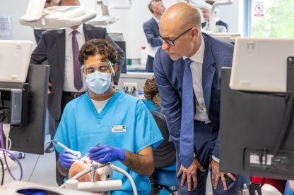 Minister of State for Care Stephen Kinnock MP and a current student at the Dental Academy