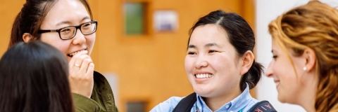 Two smiling women