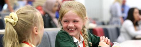 two pupils talking