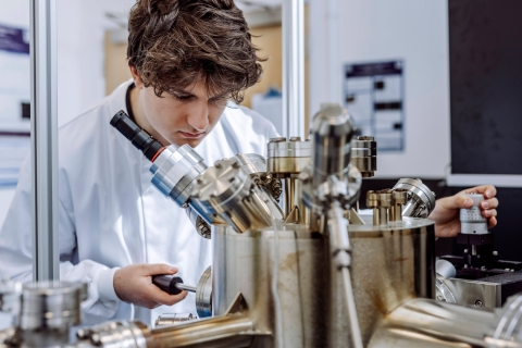 Man looking at lab equipment