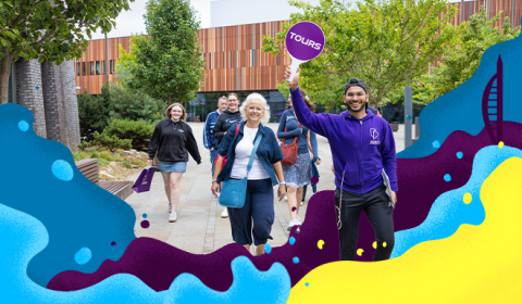 Male Student Ambassador giving a campus tour 