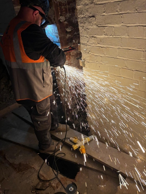 Contractors cutting steel