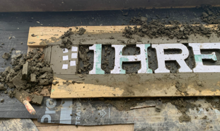 Cast moulds of lettering 