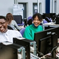 Accounting students enjoying studying in suite