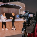 Three Students utilizing the CCI Future Technologies Virtual TV Studio