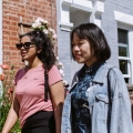 Two students walking past houses to rent in Portsmouth 