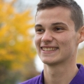 Smiling male student at open day