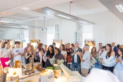 group of people attending graduate show 2025