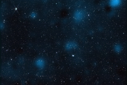 Containing nearly 800,000 galaxies, this image from NASA’s James Webb Space Telescope is overlaid with a map of dark matter, represented in blue