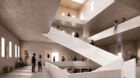 A multi‑level interior with wide staircases and natural light from skylights, with people moving through the open space.