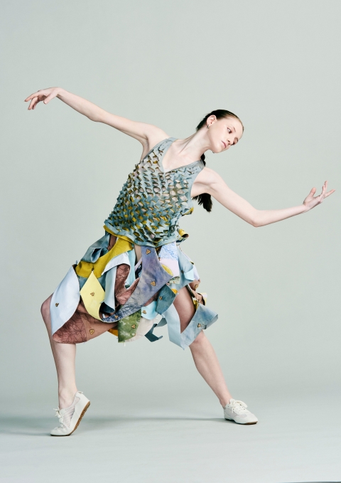 Garment by Hannah Hatchard - model is posing with arms outwards so you can see the full garment