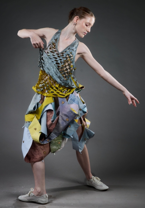 Image of Hannah Hatchards Garment with model posting while pointing downards